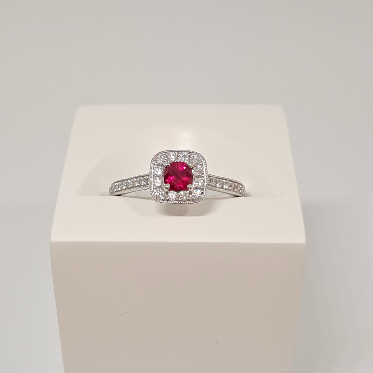 Collinsons 18ct White Gold Cushion Ruby & Diamond Halo Ring