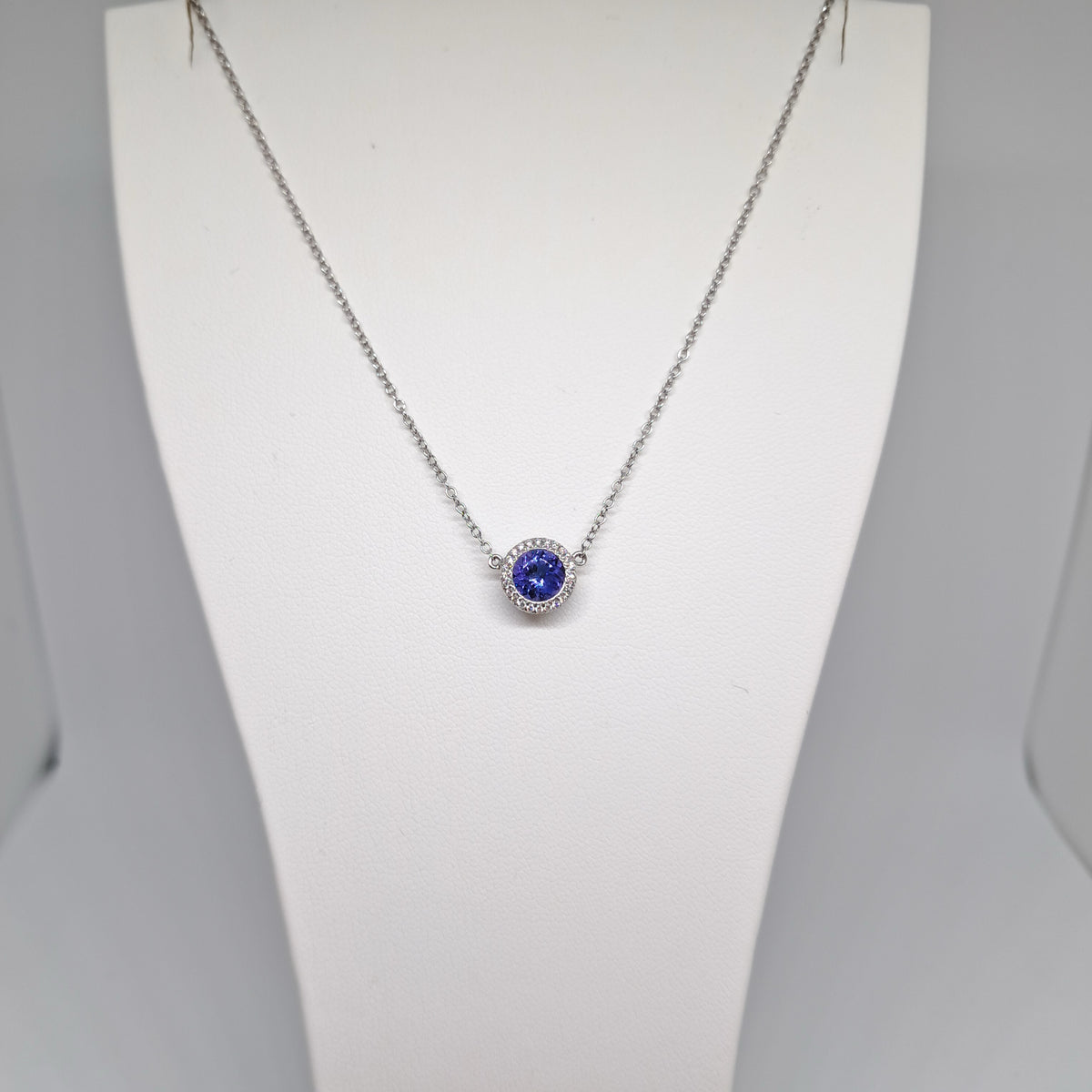 Collinsons 18ct White Gold Tanzanite & Diamond Round Macro Pendant