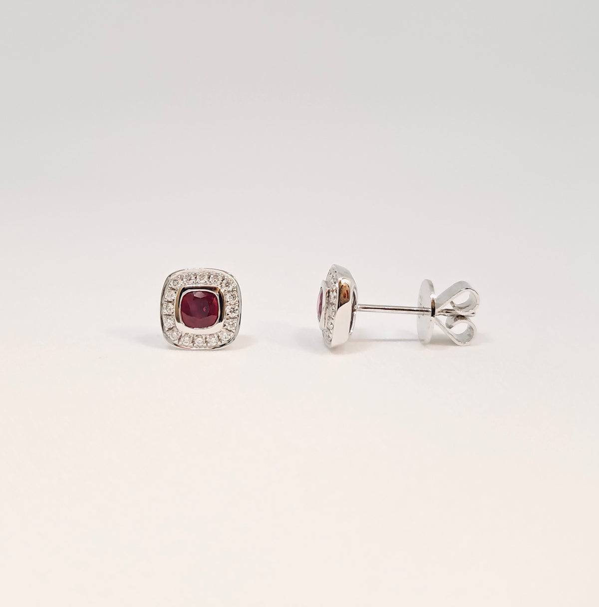 Collinsons 18ct White Gold Cushion Ruby & Diamond Halo Stud Earrings 0.64ct